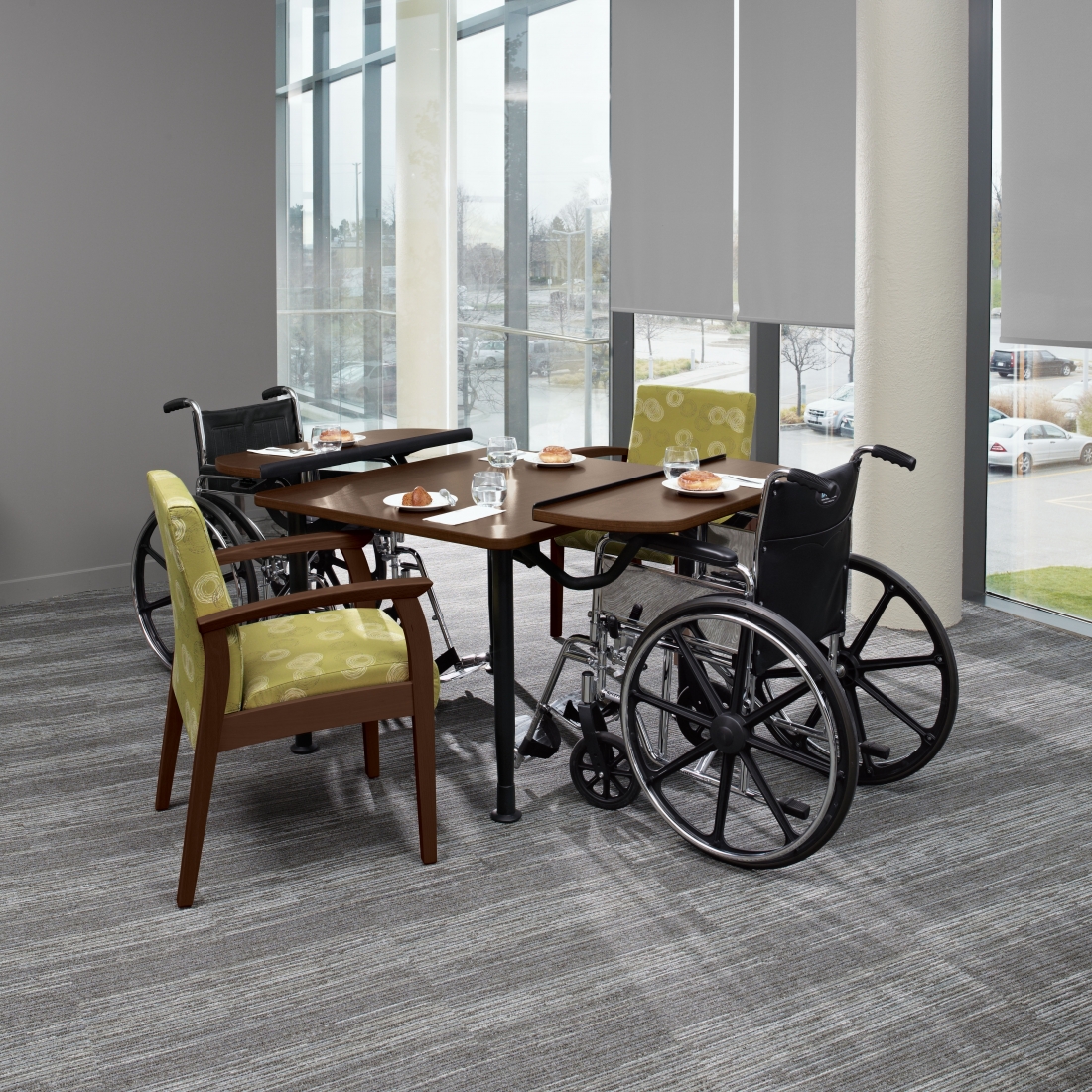 Global Furniture Group, The Enable™ table series offers a height adjustable tablet surface for people with limited